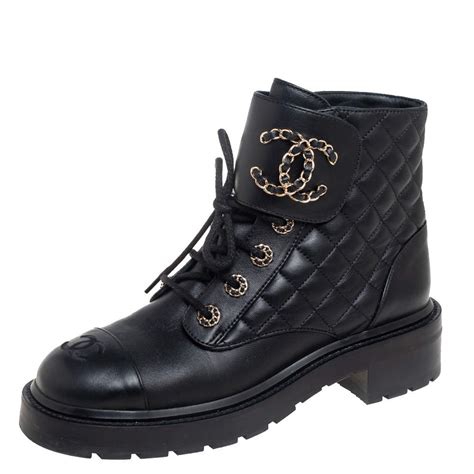 chanel ankle boots with chain.